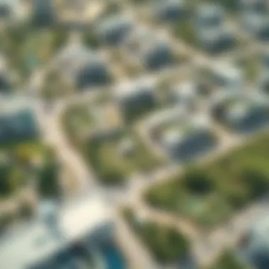 Aerial Perspective of Sustainable Urban Design Aerial view of Masaar Living community showcasing green spaces and modern architecture