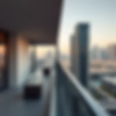A sleek modern balcony with glass railings overlooking the Dubai skyline
