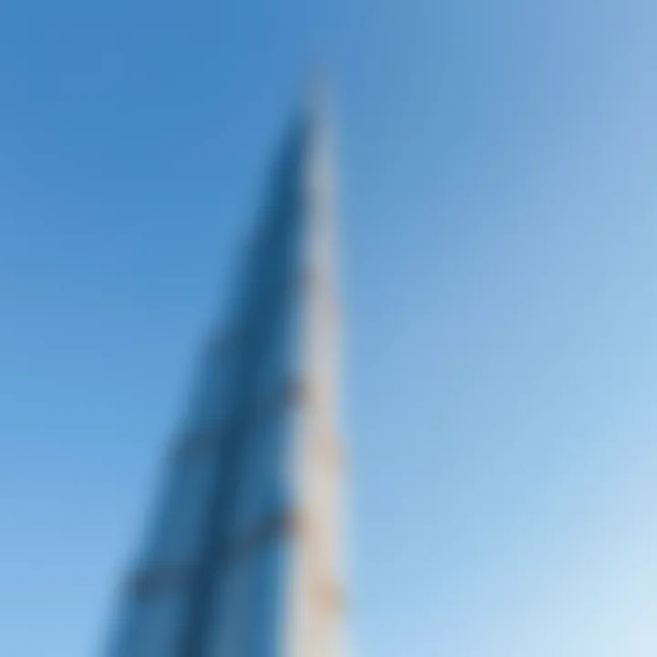 Burj Khalifa Against the Sky Stunning view of the Burj Khalifa against a clear blue sky showcasing its towering height.